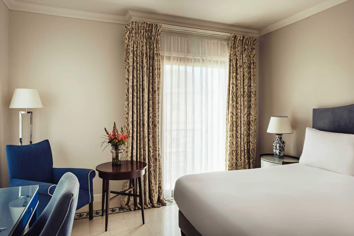 Premium bedding, free minibar items, in-room safe, desk