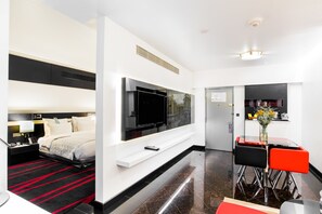 Suite | Living area | 43-inch LED TV with satellite channels, TV, DVD player - Le Meridien Bangalore (Bengaluru)