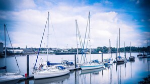 A marina with several sailboats docked at the pier. - Travelodge Waterford (Waterford)