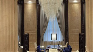 A luxurious lobby with a grand chandelier, elegant furniture, and ornate architectural details. - Sheraton Grand Pune Bund Garden Hotel (Pune)