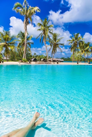 2 outdoor pools, pool umbrellas, pool loungers