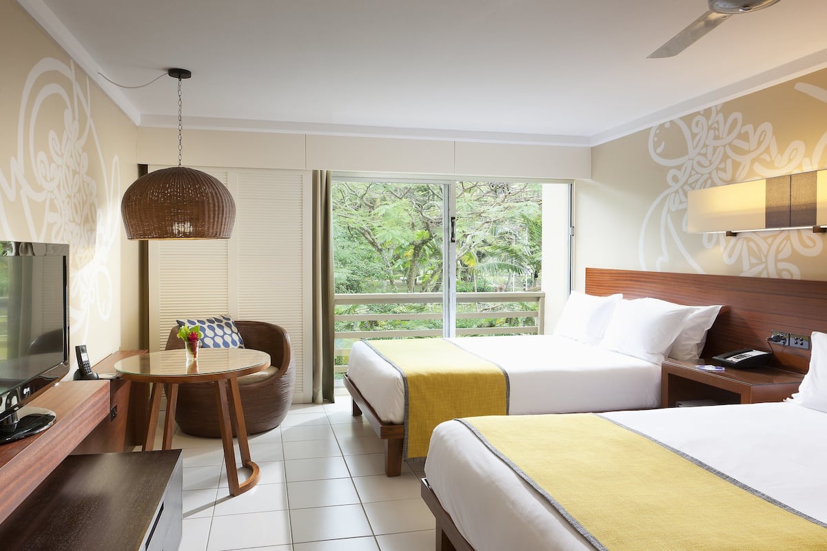 Standard Room, 2 Double Beds | 1 bedroom, in-room safe, blackout drapes, soundproofing