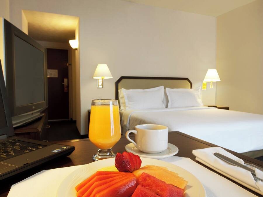 Superior Room King | Hypo-allergenic bedding, in-room safe, desk, iron/ironing board