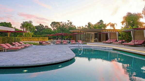 Indoor pool, seasonal outdoor pool, pool umbrellas, pool loungers