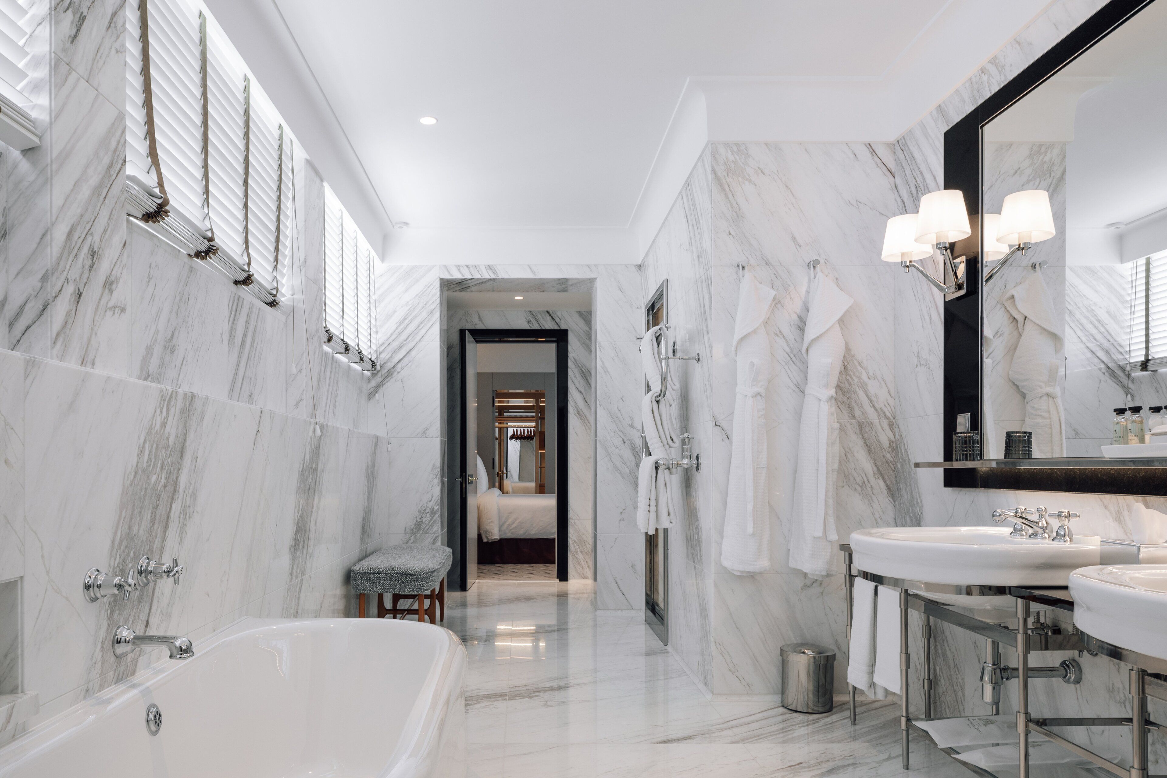 separate bathtub and shower, deep-soaking bathtub, designer toiletries