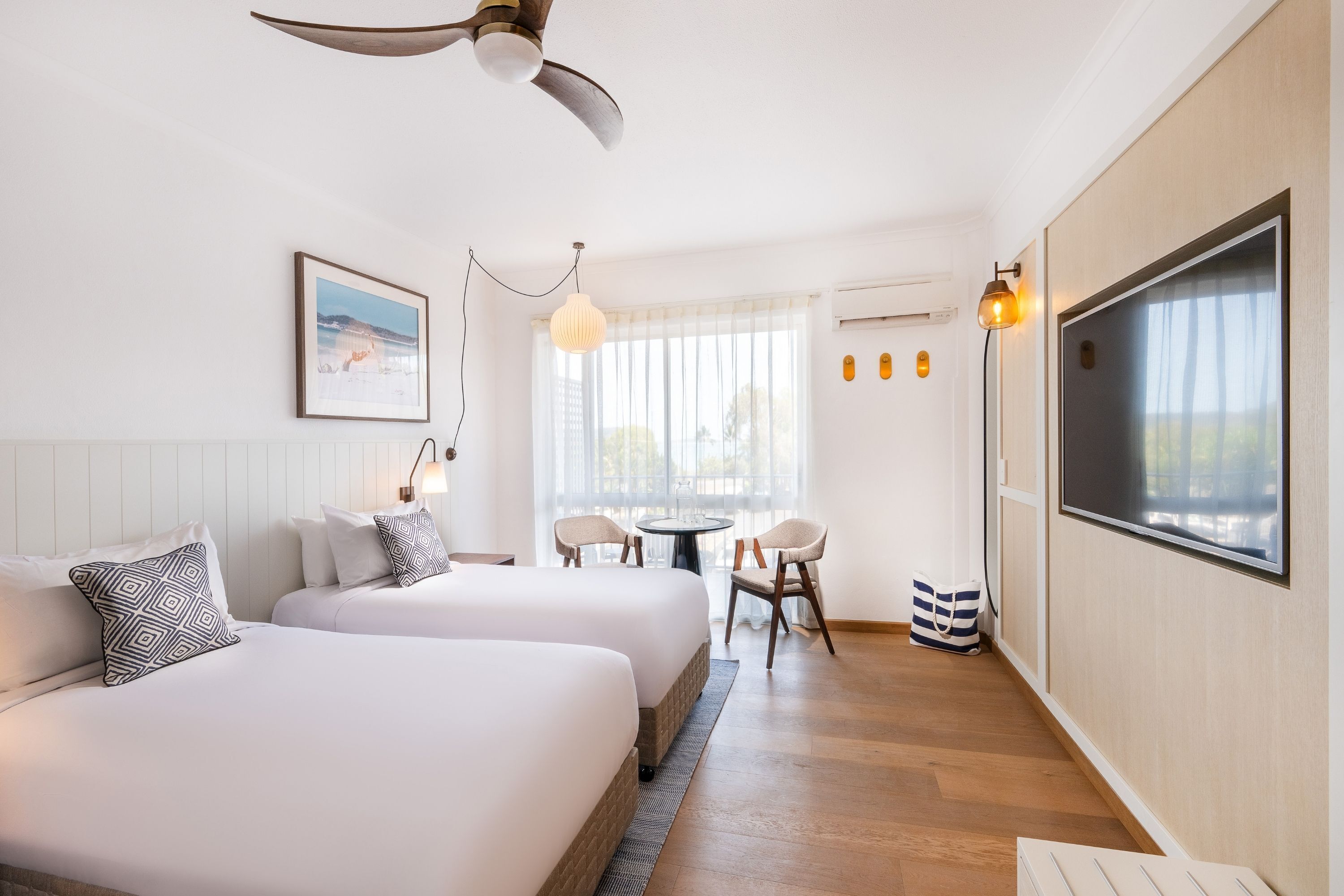 coastal interior room | in-room safe, blackout curtains, iron/ironing board, free wifi