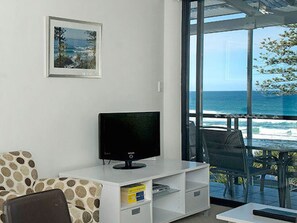 32-inch flat-screen TV with cable channels, TV