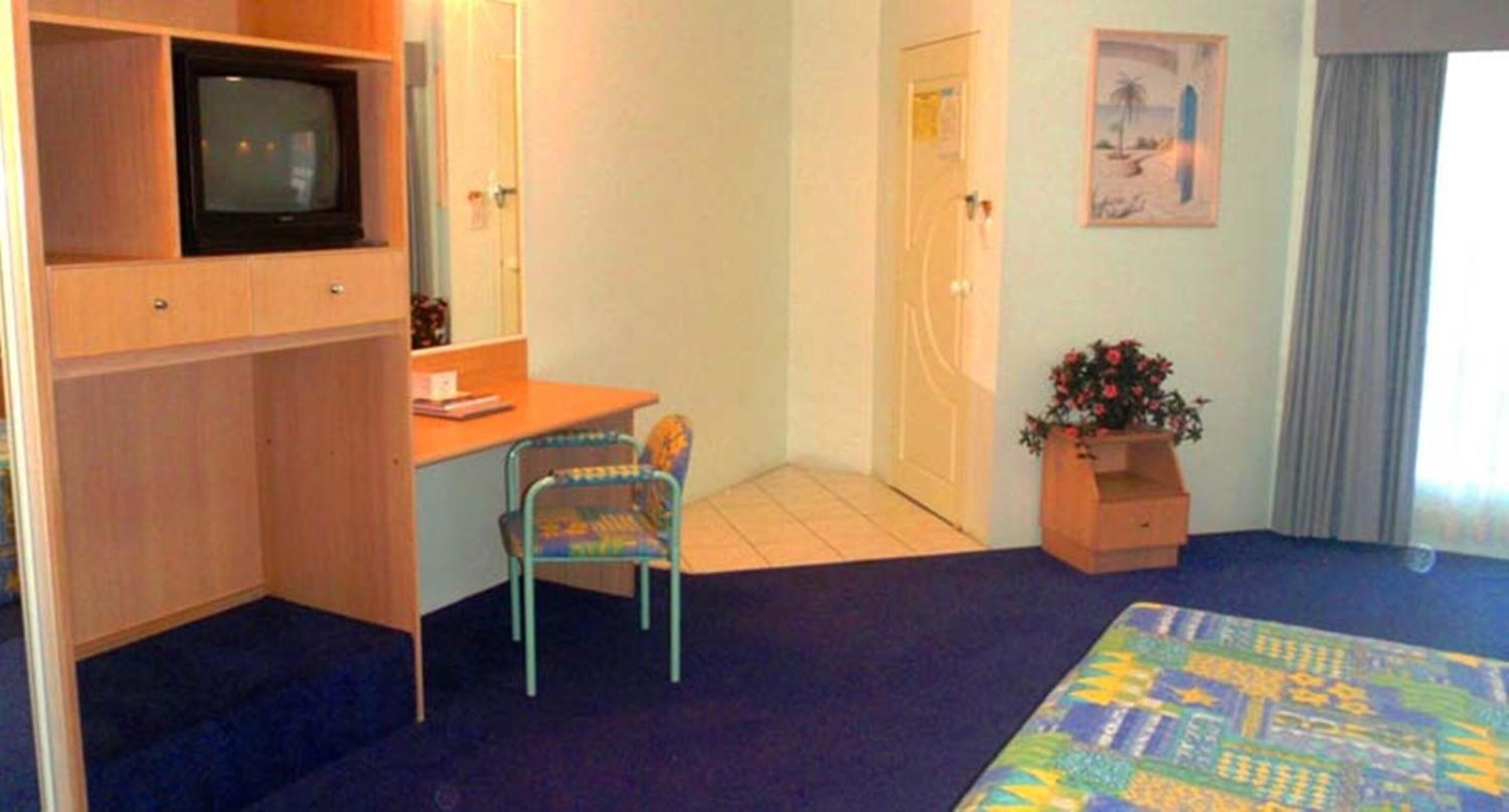 Foto - Runaway Bay Motor Inn