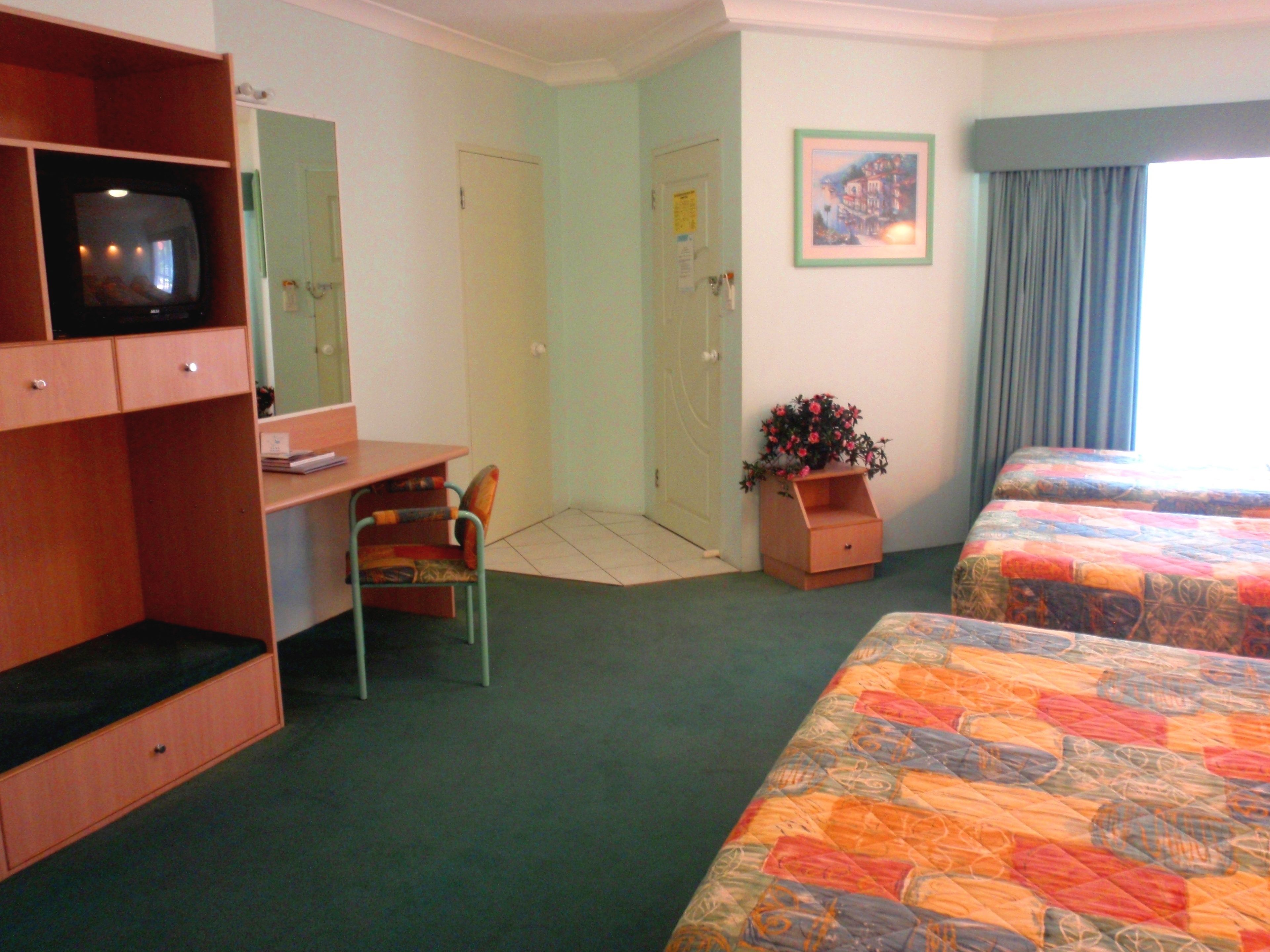 Foto - Runaway Bay Motor Inn