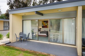 Familienzimmer, Mehrere Betten, Gartenblick | Terrasse/Patio