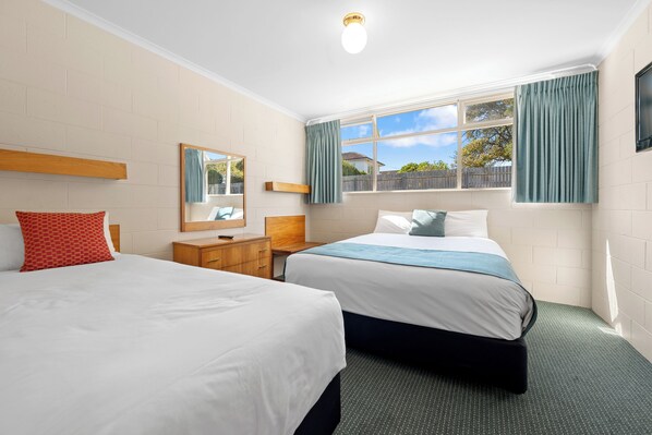 Standard Room, Multiple Beds, Non Smoking | Premium bedding, individually furnished, desk, blackout drapes