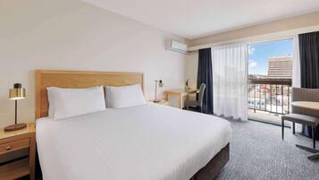 Standard Room, 1 King Bed, Non Smoking, Balcony | Premium bedding, laptop workspace, blackout drapes, iron/ironing board