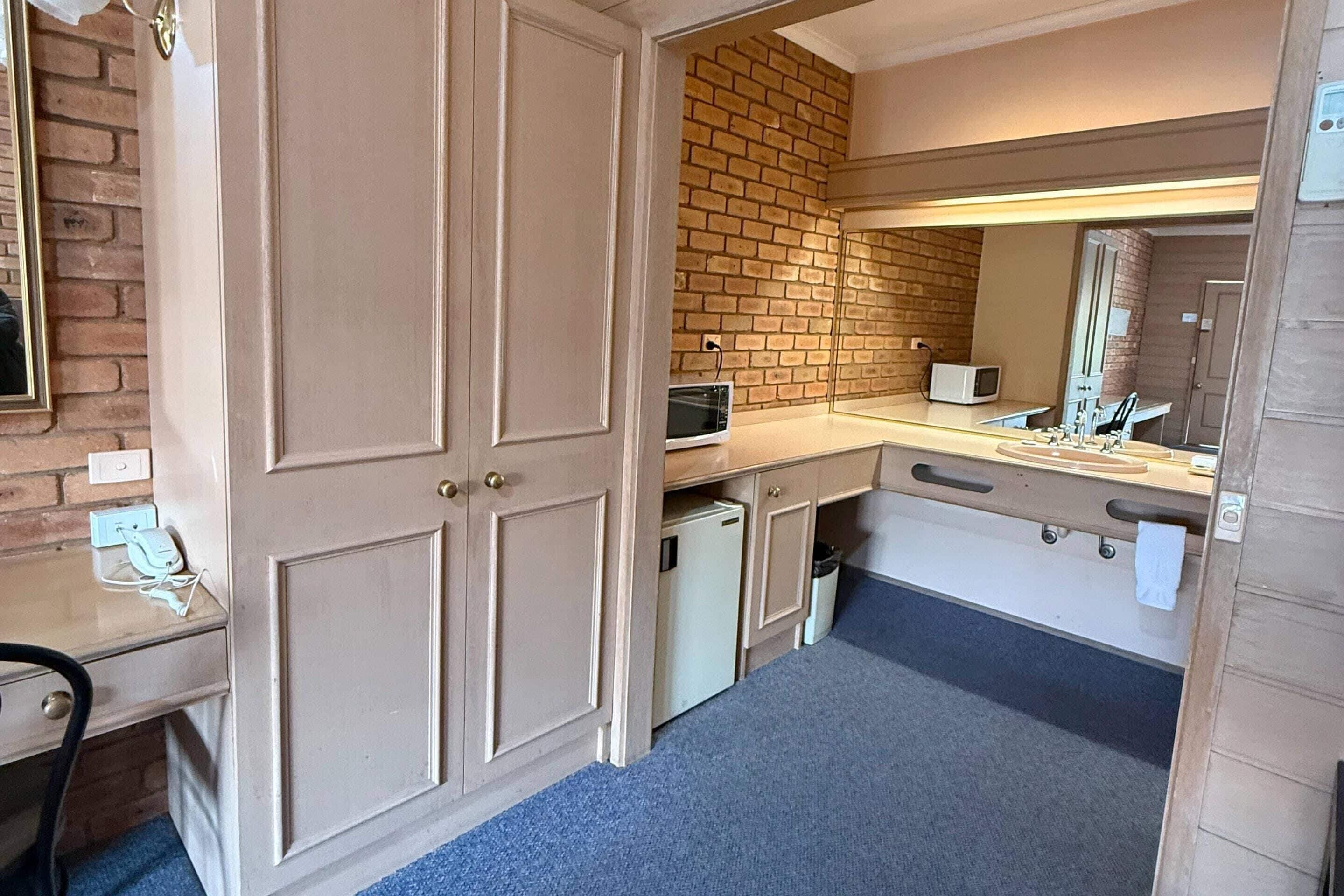 Standard Room, Multiple Beds, Non Smoking | Minibar, in-room safe, desk, soundproofing