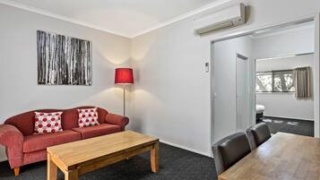 Executive Queen, Larger Unit | Minibar, in-room safe, desk, soundproofing