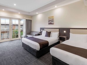 Executive Twin Suite (Located Upstairs Only) | Desk, iron/ironing board, free WiFi, bed sheets