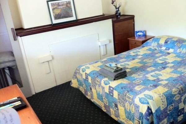 Blackout drapes, iron/ironing board, free WiFi, bed sheets