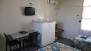 Blackout curtains, iron/ironing board, free WiFi, bed sheets