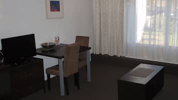 Garden View Queen Ground Floor | Living area | 26-inch LCD TV with digital channels, TV, video library