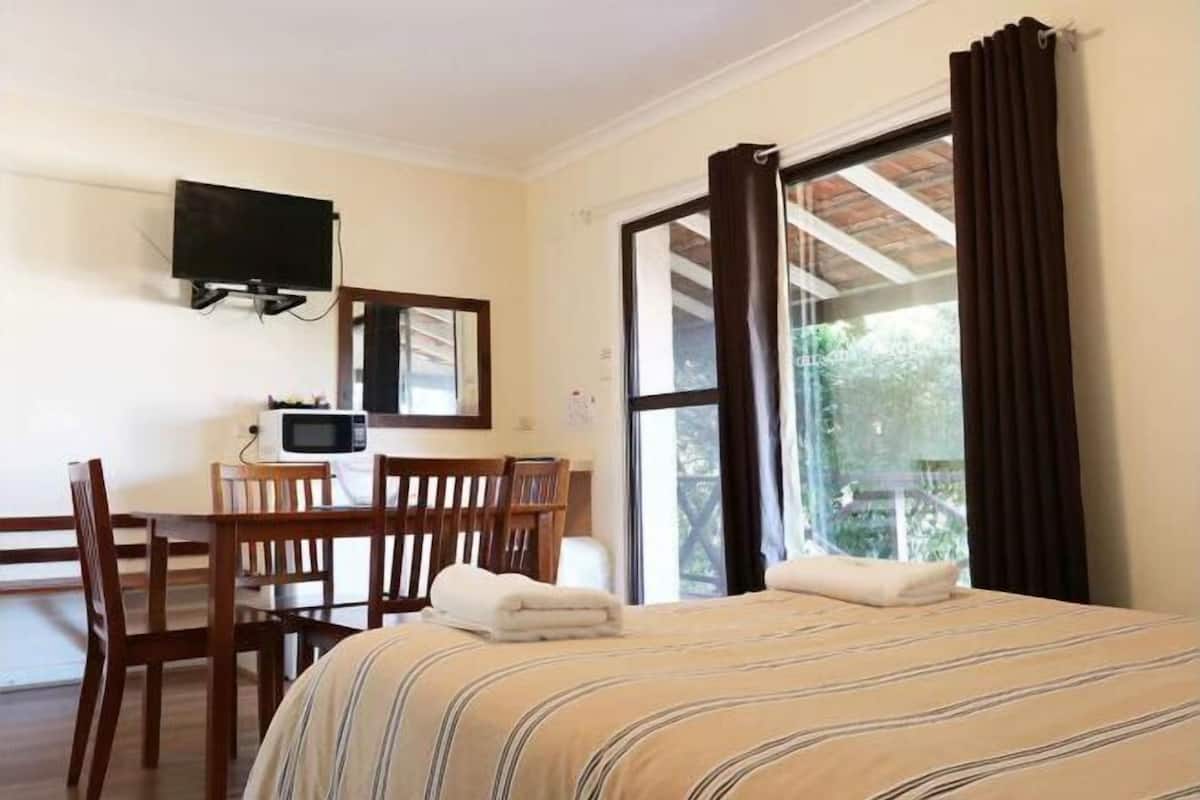 Premium bedding, memory-foam beds, iron/ironing board, free WiFi