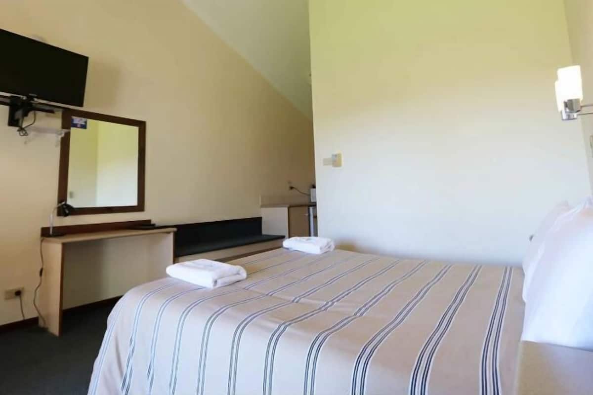Premium bedding, memory-foam beds, iron/ironing board, free WiFi