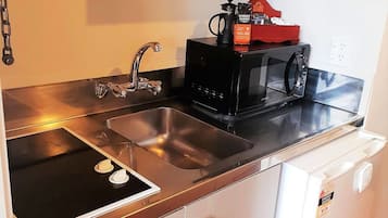 Mini-fridge, microwave, stovetop, electric kettle