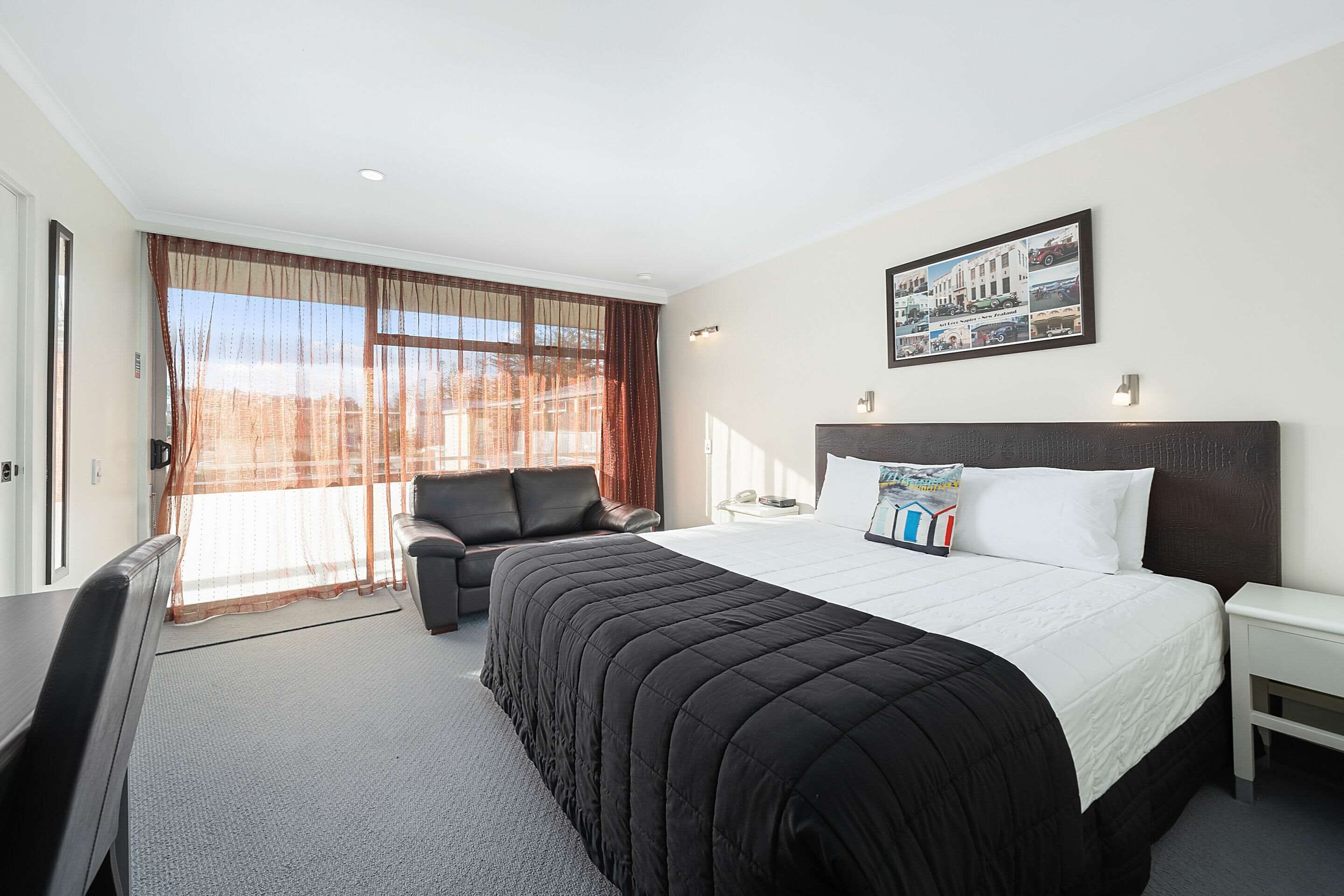 room, 1 king bed, non smoking | in-room safe, iron/ironing board, cots/infant beds, free wifi