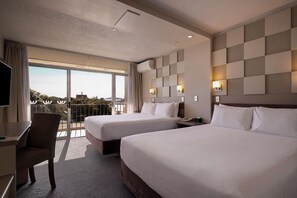 A hotel room with two beds, a desk, a chair, and a balcony with a view. - Sudima Lake Rotorua (Rotorua)