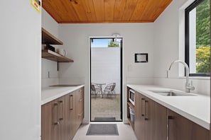 Premium Two Bedroom Apartment with Spa Pool | Private kitchen | Coffee/tea maker, electric kettle