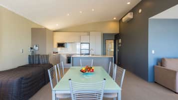 Premium Apartment, 2 Bedrooms | Living area | 32-inch LCD TV with premium channels, TV