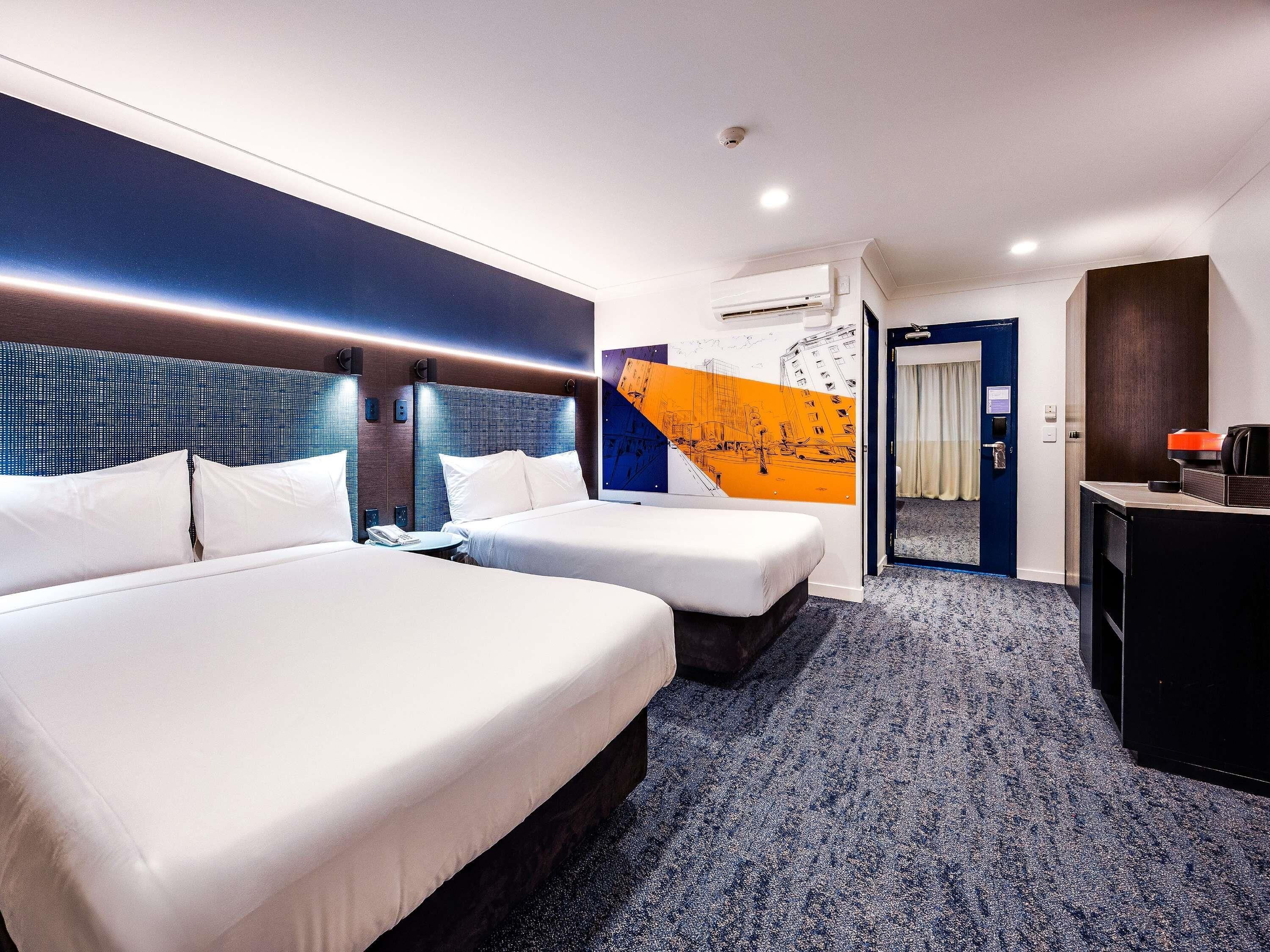 Executive Room, 2 Double Beds | Desk, laptop workspace, blackout drapes, iron/ironing board