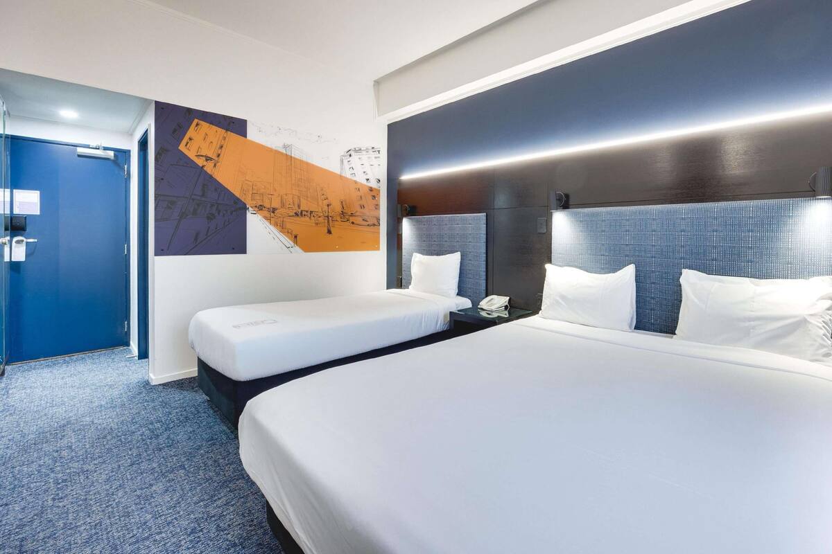 Standard Room, Multiple Beds | Desk, laptop workspace, blackout drapes, iron/ironing board