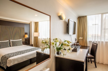 Superior Double Double | Desk, laptop workspace, blackout drapes, iron/ironing board. Mercure Wellington Abel Tasman