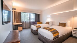 Habitación superior con 2 camas individuales | Ropa de cama de alta calidad y minibar 
