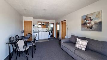 Two Bedroom Accessible Shower | Living area | 32-inch flat-screen TV with satellite channels, TV