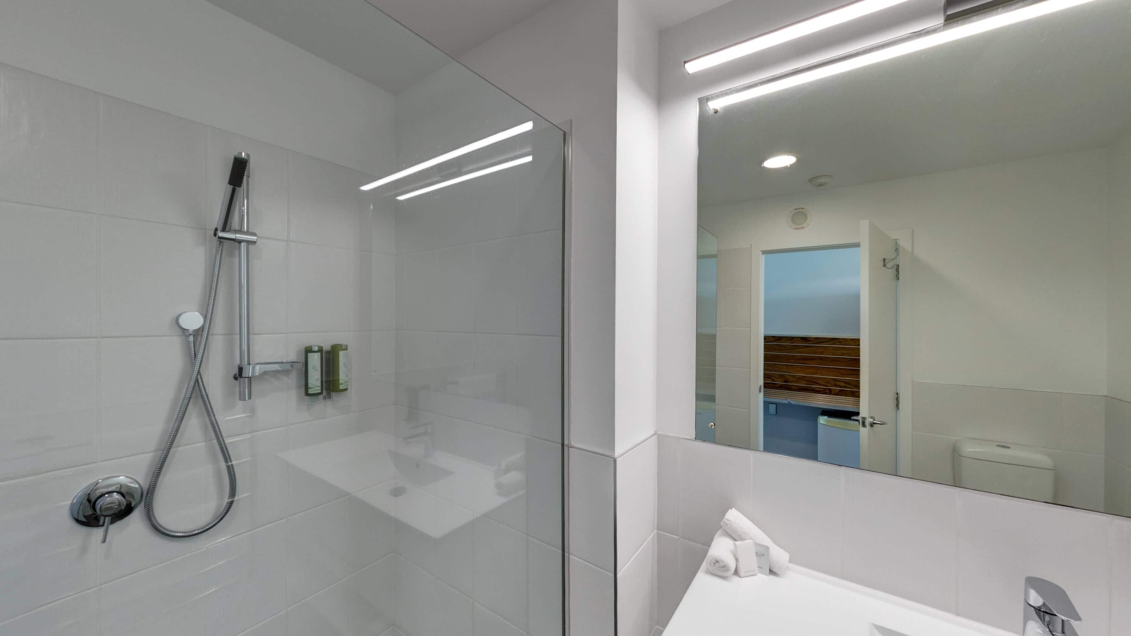 ocean view deluxe twin room | bathroom | free toiletries, hair dryer, towels