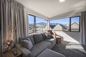 Family Apartment, 2 Bedrooms, 2 Bathrooms, Mountain View | Living area | 30-inch plasma TV with digital channels, TV, iPod dock