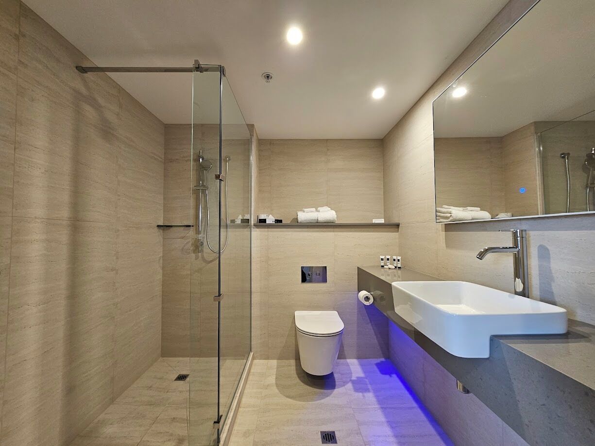deluxe family suite | bathroom | free toiletries, hair dryer, towels, soap