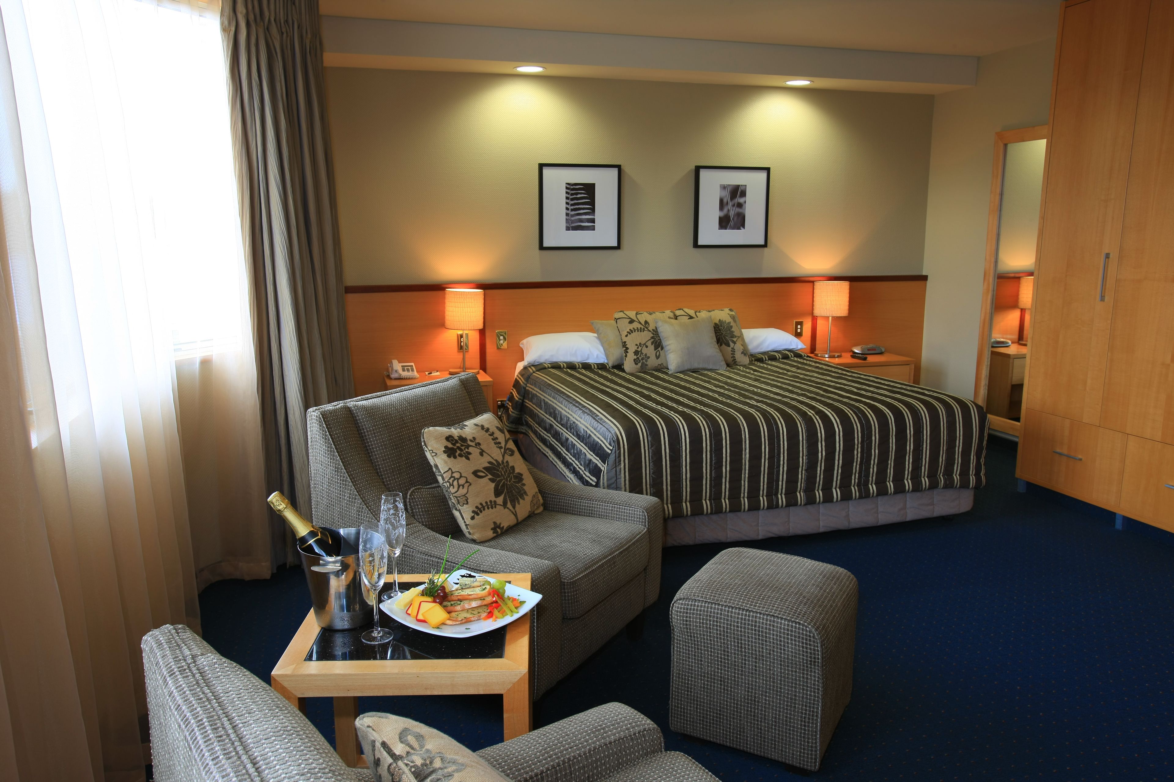 deluxe suite, 1 king bed | in-room safe, iron/ironing board, free cots/infant beds, free wifi