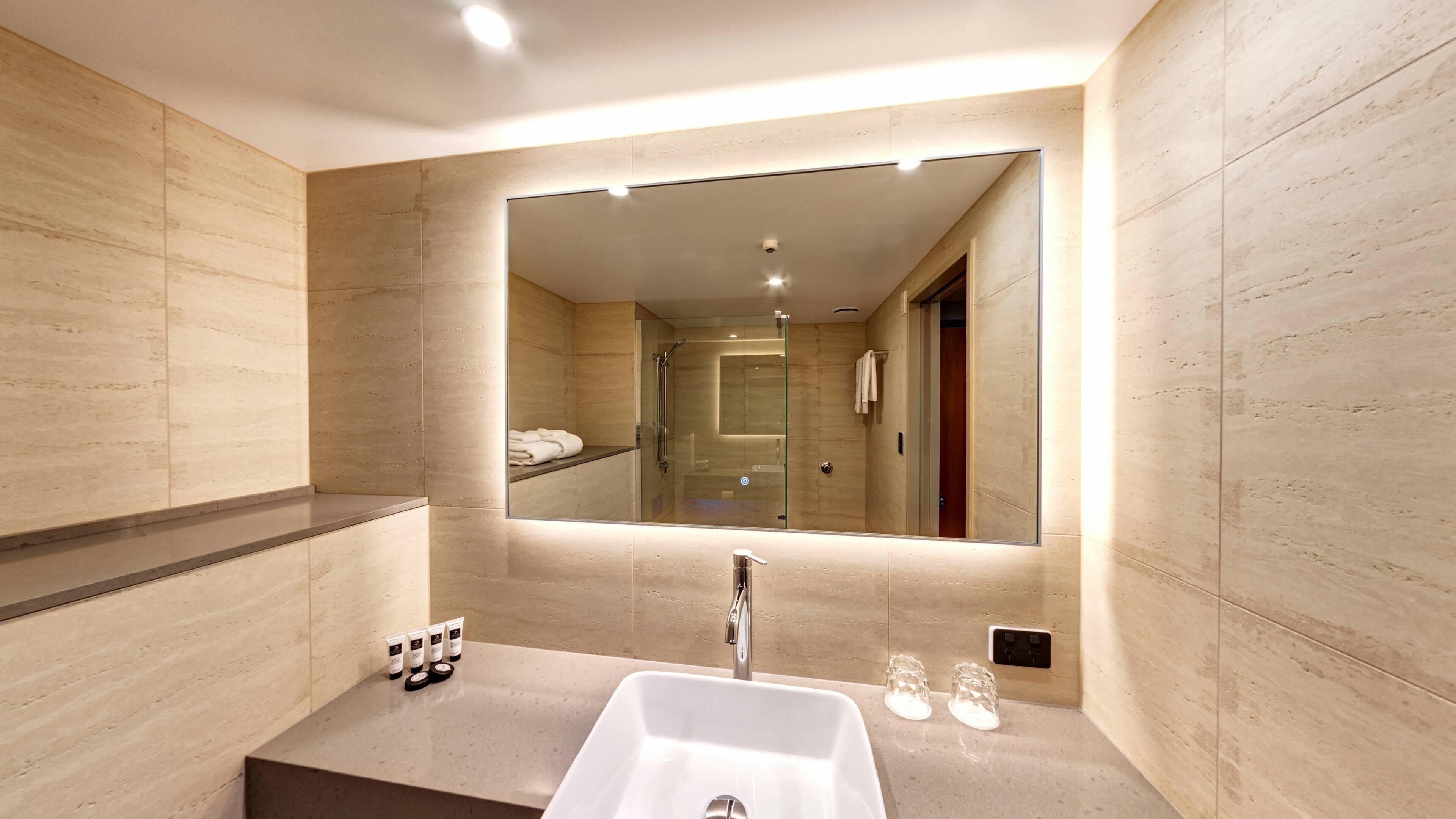 deluxe room, 1 king bed | bathroom | free toiletries, hair dryer, towels, soap