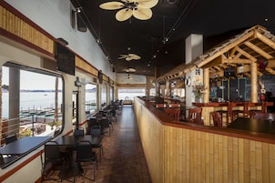 3 bars/lounges, poolside bar, beach bar