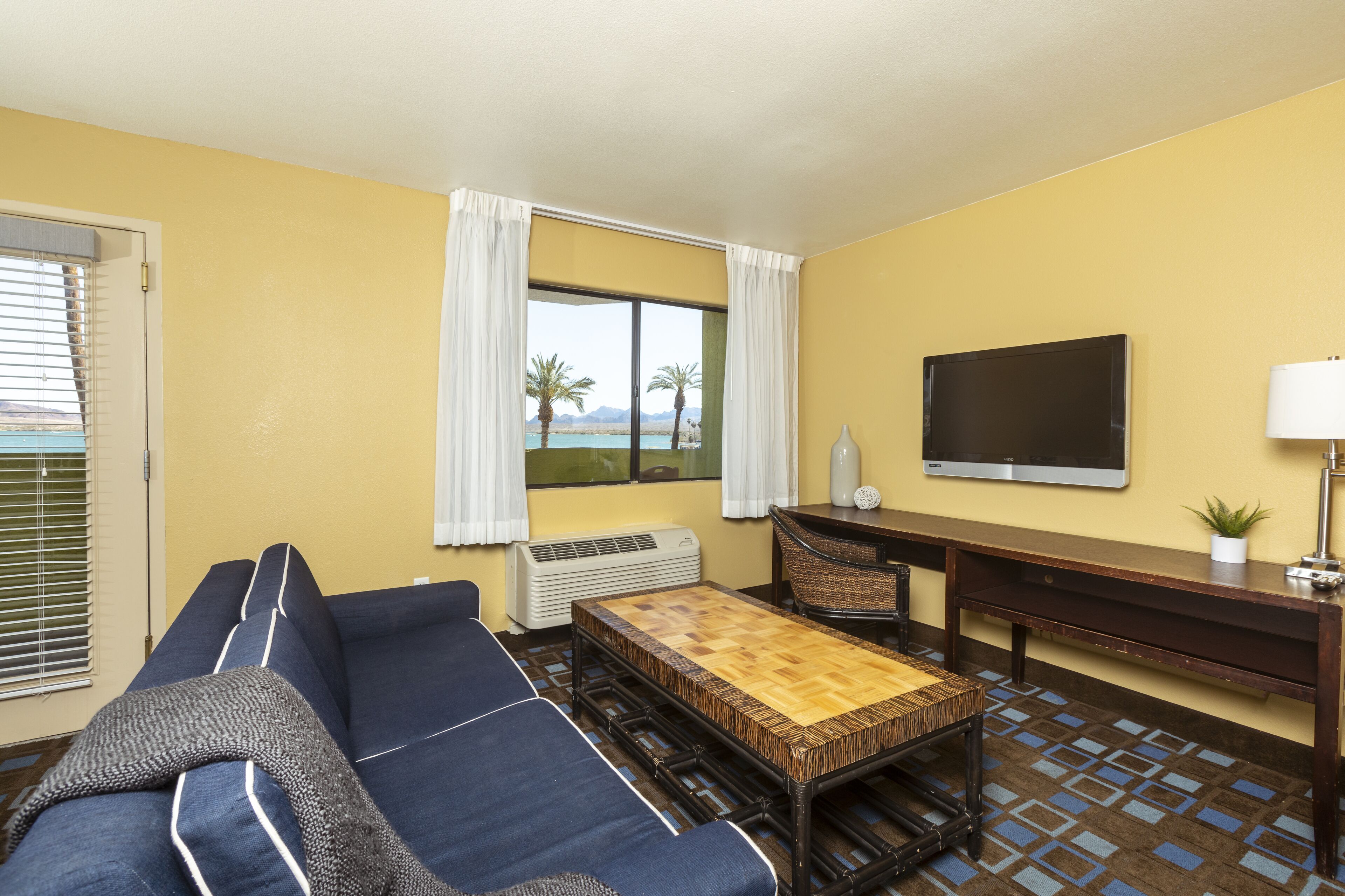 Premium bedding, pillow-top beds, desk, laptop workspace