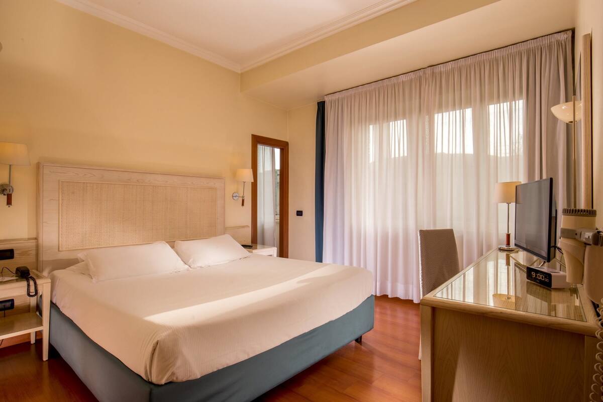 In-room safe, desk, blackout curtains, soundproofing