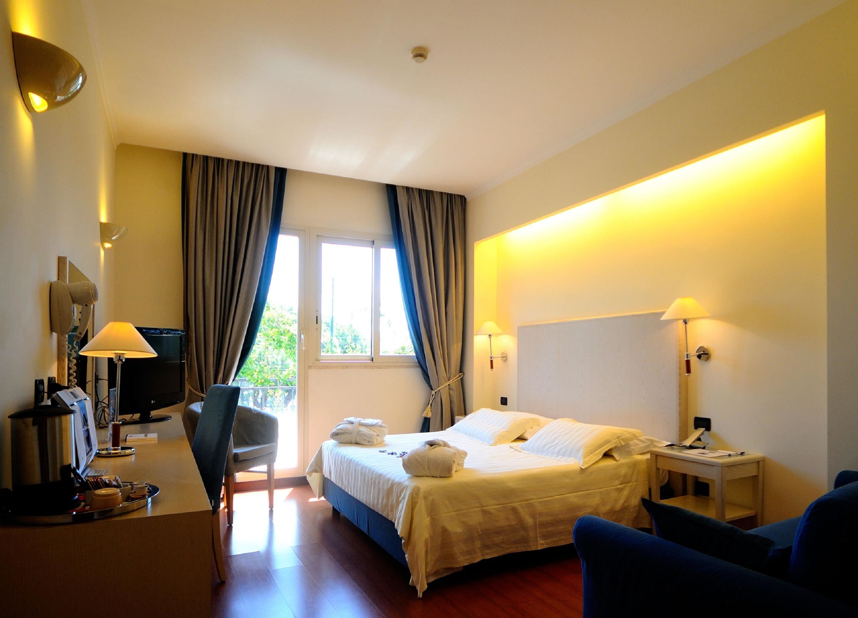 In-room safe, desk, blackout curtains, soundproofing