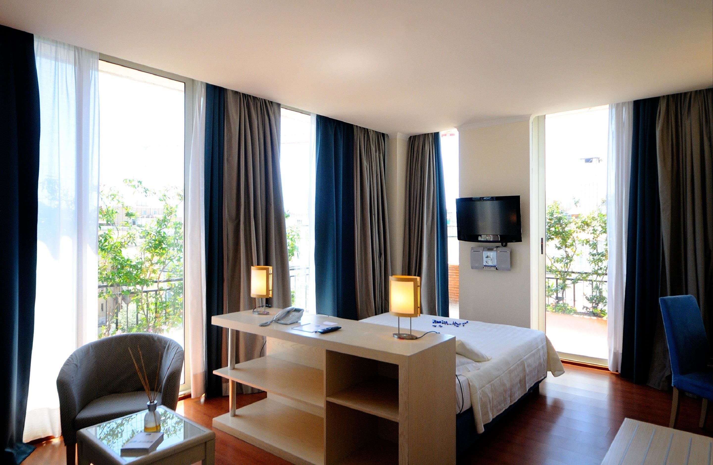 In-room safe, desk, blackout curtains, soundproofing