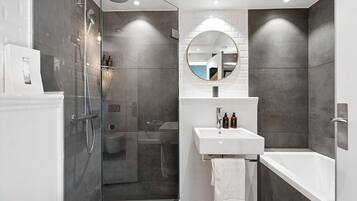 Eco-friendly toiletries, hair dryer, towels