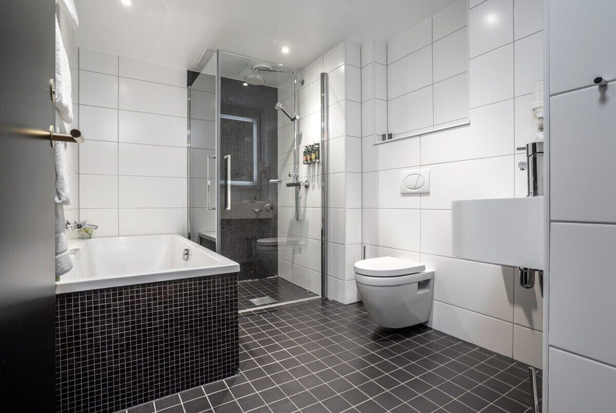 junior suite | bathroom | eco-friendly toiletries, hair dryer, bathrobes, slippers