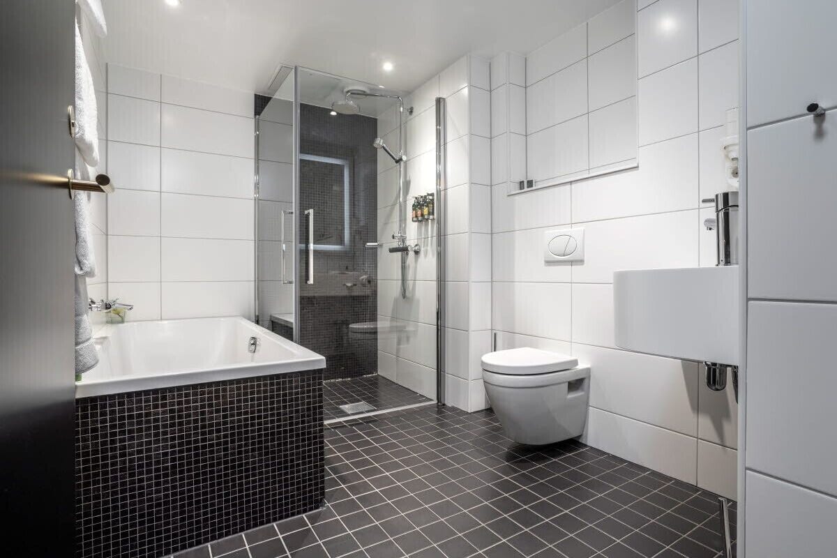 junior suite | bathroom | eco-friendly toiletries, hair dryer, bathrobes, slippers