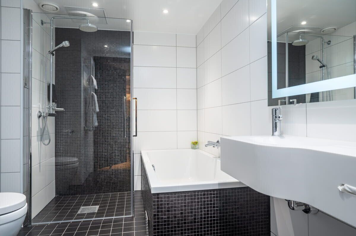 suite, non smoking | bathroom | eco-friendly toiletries, hair dryer, bathrobes, slippers