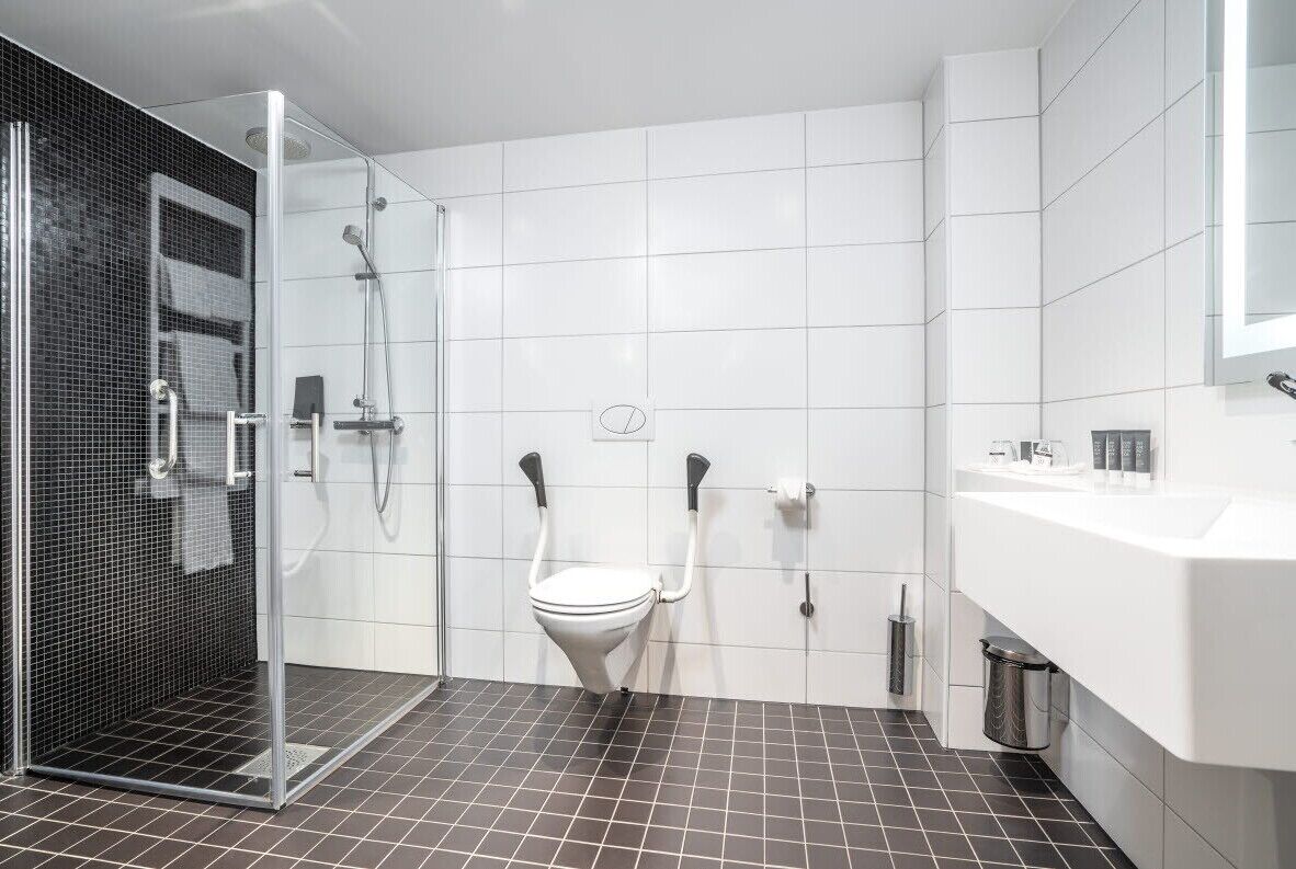 accessible room | bathroom | eco-friendly toiletries, hair dryer, bathrobes, slippers