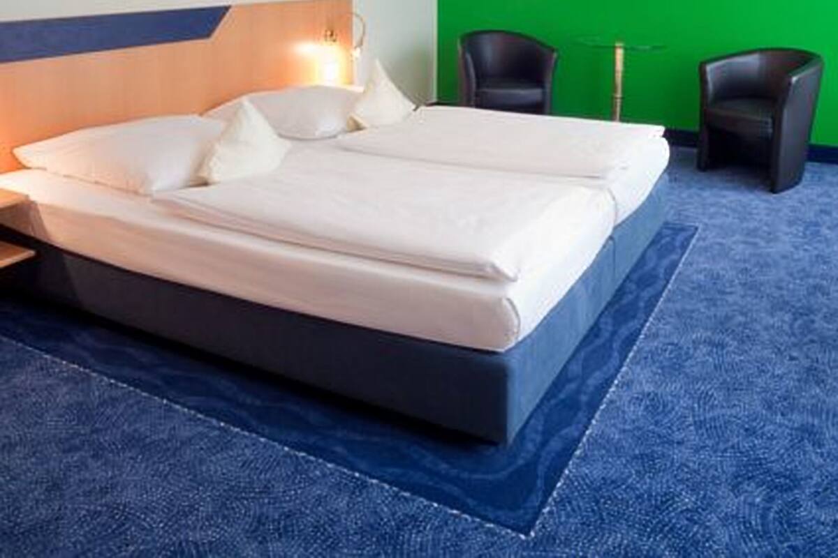 Dreibettzimmer | Zimmersafe, schallisolierte Zimmer, kostenloses WLAN, Bettwäsche